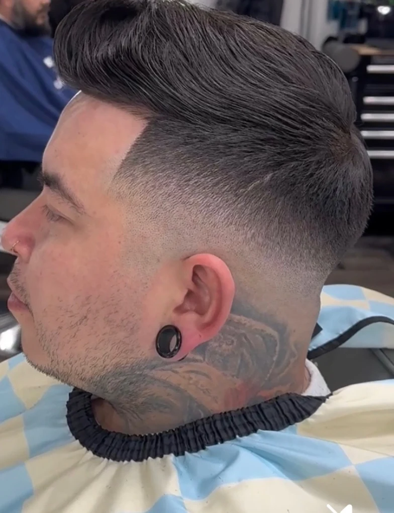 Skin fade with a sharp line-up