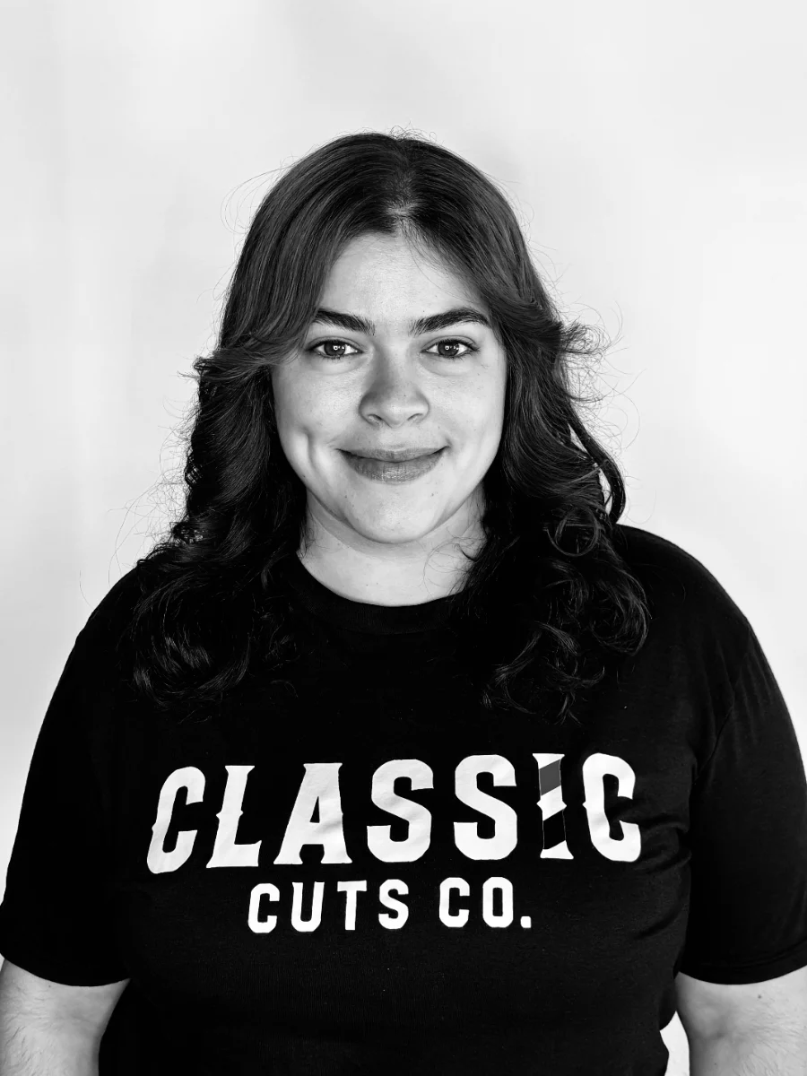 Genesis Tello, master barber and family stylist